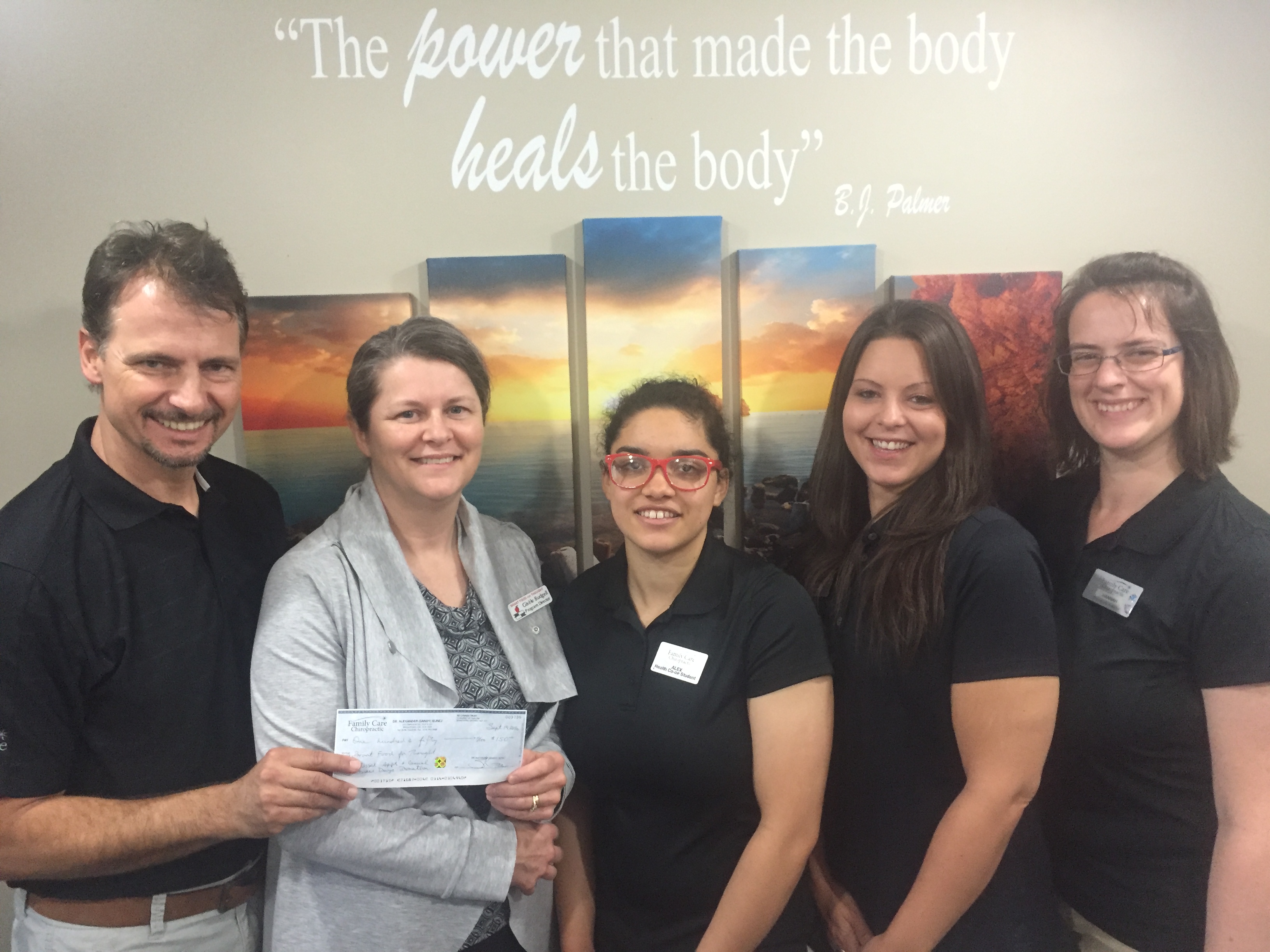 Family Care Presents a Cheque to Brant Food for Thought 